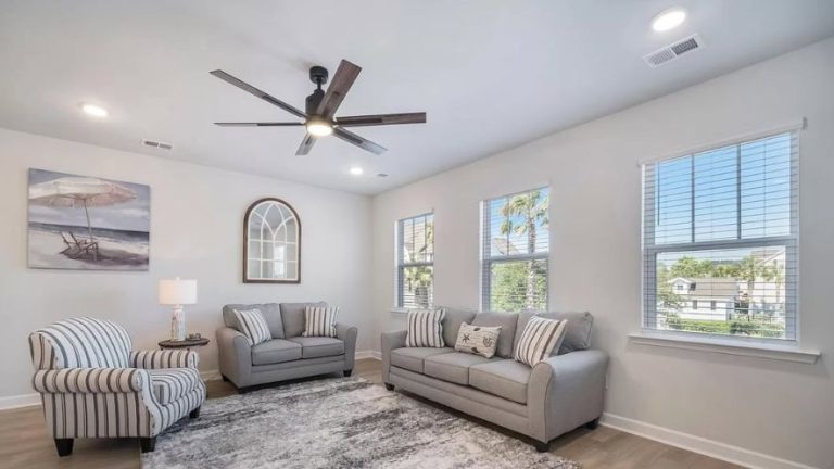 Well-furnished living room in a Charleston short-term rental